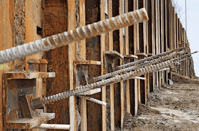 Anchored retaining wall/Tie back system